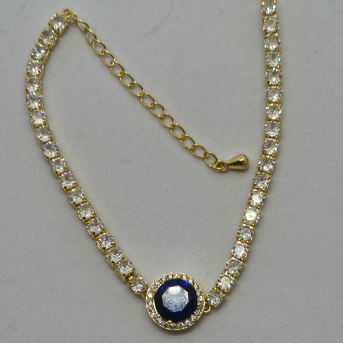 Golden Plated Blue Center Stone Tennis Bracelet