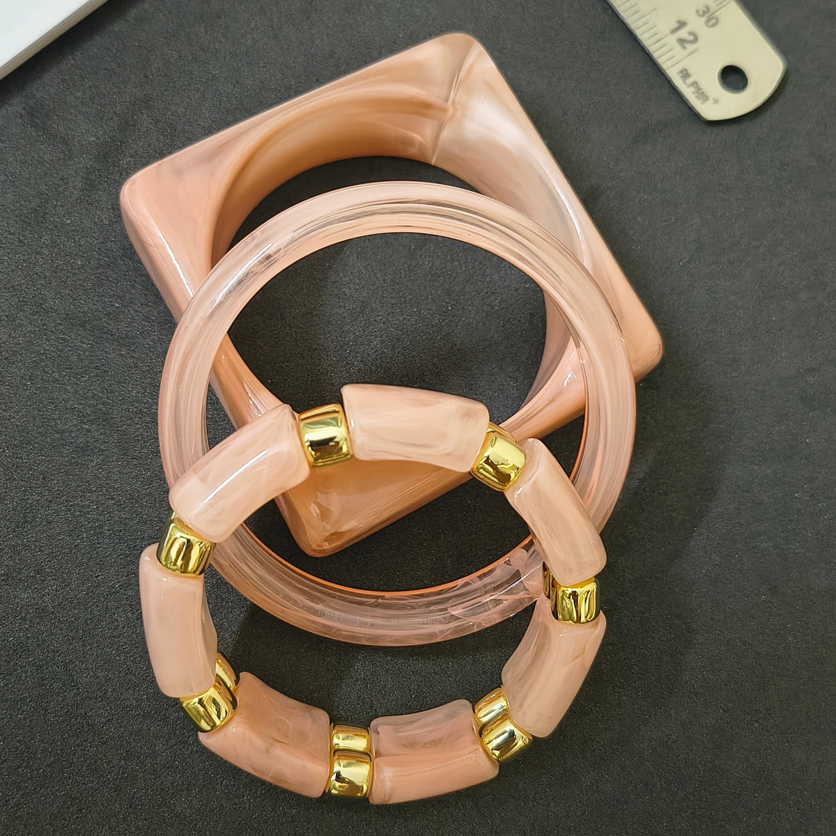 Stretchable and Fixed Stack of Acrylic Bangles